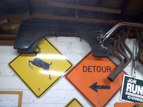 1978 Ford Bronco - Construction signs are displayed, indicating potential hazards or directions.