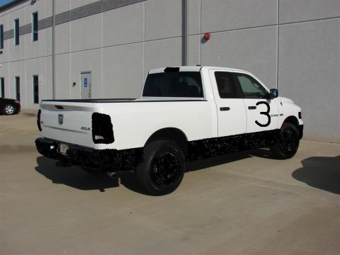 1995 Mercury Grand Marquis - Pickup truck with custom black accents and a large number 3 on the side.