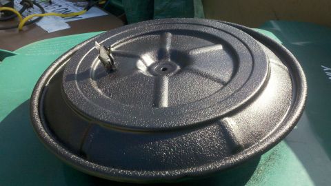 1978 Ford Bronco - A textured black air cleaner assembly is shown, with a metal clip securing the lid.