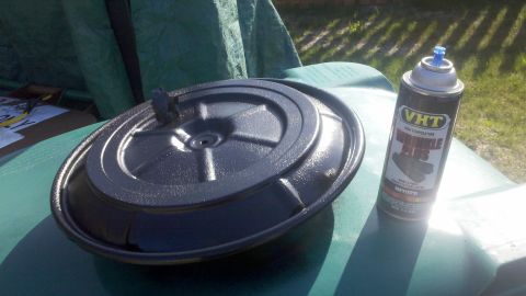 1978 Ford Bronco - A freshly painted air cleaner assembly sits on a green tarp next to a can of VHT engine enamel.