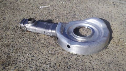1978 Ford Bronco - This metal air cleaner assembly is shown from a side angle on a concrete surface.