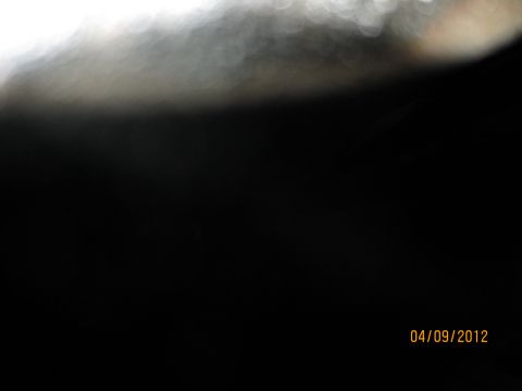 1979 Ford Bronco - This image shows a dark interior with bokeh highlights and a text overlay indicating the date and a website.