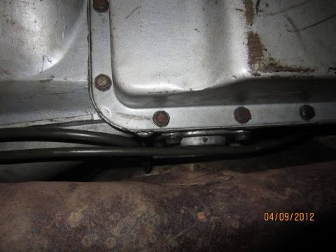 1979 Ford Bronco - Transmission pan and exhaust pipe detail, photographed on 04/09/2012.