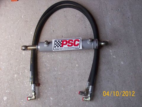 1982 Ford F-100 - PSC hydro assist cylinder with hoses, photographed on 04/10/2012.