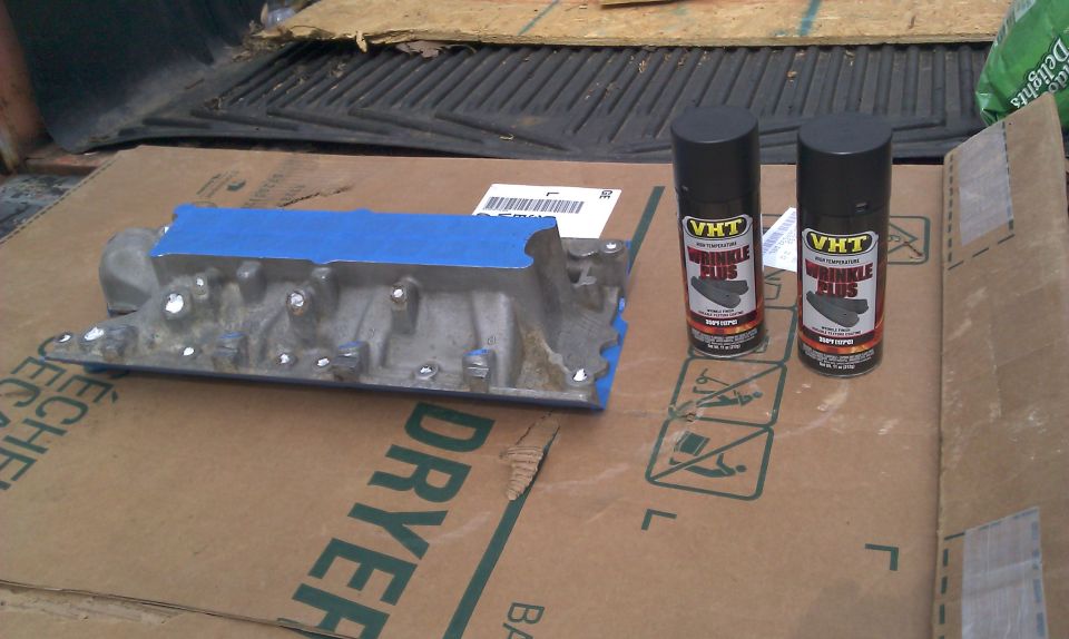 Lower intake manifold pictured next to the VHT Wrinle Paint im coating it with
