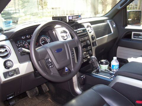 1978 Ford F-150 - The interior of a Ford F-150 truck, a modern dashboard and center console.