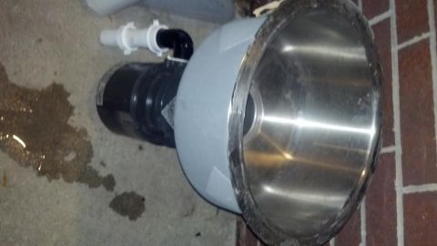 2000 Mercury Grand Marquis - A pool pump and filter assembly is shown on a concrete surface next to a brick wall.