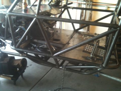 1966 Ford Bronco - Custom buggy chassis construction in progress, showing the tubular frame and floor.