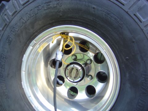1986 Ford Bronco - Limped it to work with a shoe lace holding the valve stem so it does not leak.