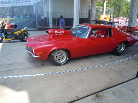 1982 Chevrolet Camaro - This modified Chevrolet has a prominent hood scoop and racing interior.