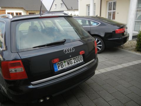 2010 Audi A4 - Rear view of a black Audi A6 Avant wagon with a license plate from 2006.