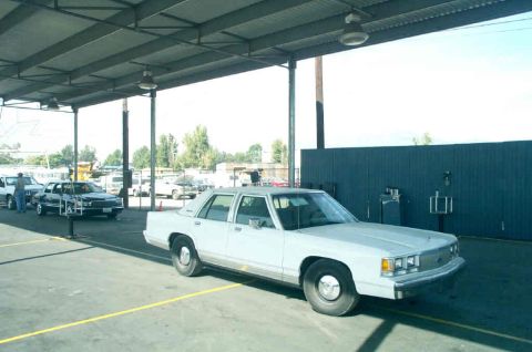 1991 Ford LTD Crown Victoria - This 1991 Ford Crown Victoria LTD is seen from a 3q-front angle in a covered lot.