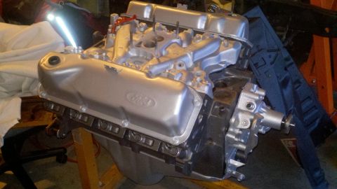1978 Ford Bronco - A silver Ford V8 engine, likely undergoing a rebuild, is shown mounted on an engine stand.
