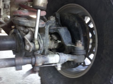1978 Ford Bronco - Front suspension and steering linkage detail, showing tie rod ends and ball joints.