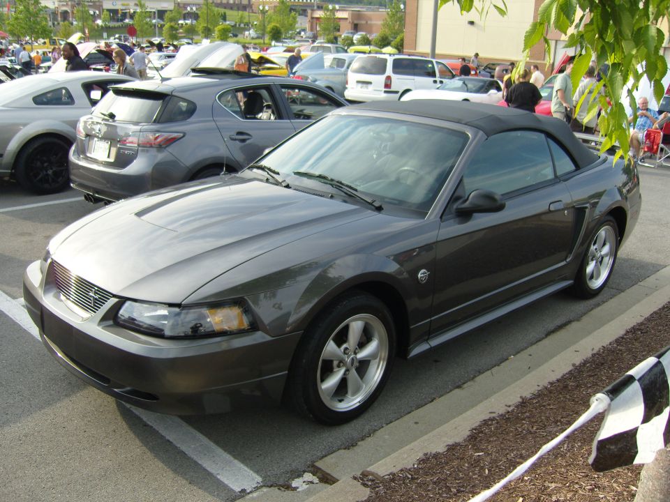 Dark gray convertible with black top, 3/4 front view