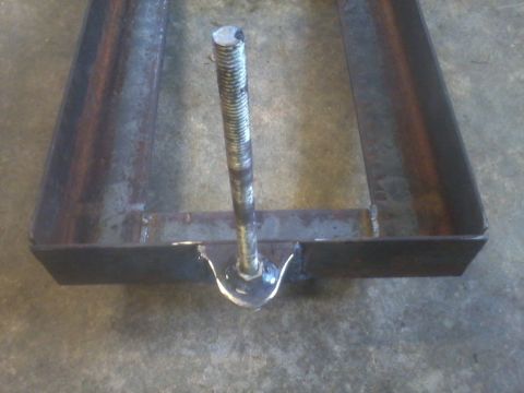 1995 Ford F-150 - This is a metal battery tray with a bolt. It does not appear to be from a 1995 Ford F-150.