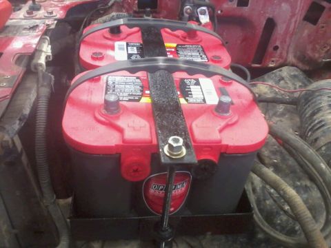 1995 Ford F-150 - Dual Optima batteries installed in a vehicle's engine bay, likely for increased power needs.