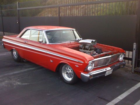 1964 Ford Ranchero - Custom 1964 Ford Falcon coupe with a prominent supercharger setup and racing wheels.