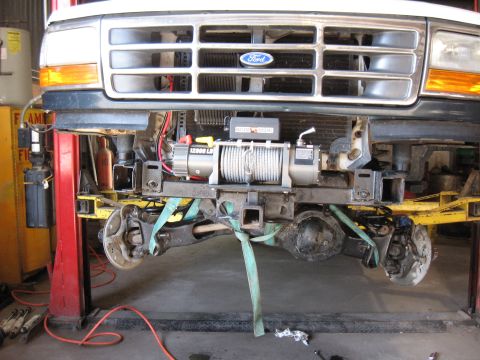1994 Ford Bronco - Front view of a 1994 Ford Bronco showing a winch and tow hitch installed.