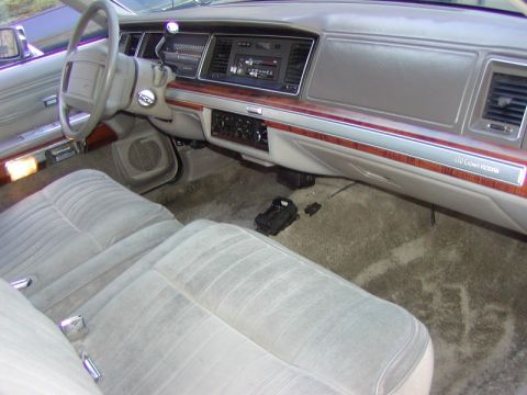 1991 Ford LTD Crown Victoria - Interior view of a 1991 Ford Crown Victoria LTD, highlighting the dashboard and seating.