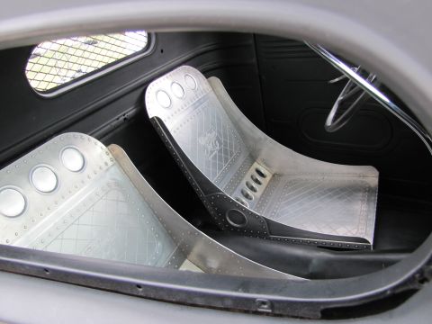 2006 BMW 5 Series - Custom aluminum racing seats with diamond plate patterns are visible inside the vehicle's interior.