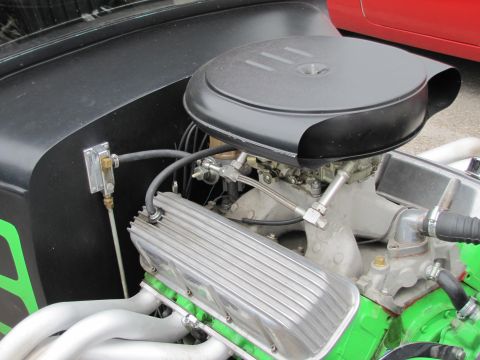 2006 BMW 5 Series - Close-up view of a custom engine with prominent exhaust headers and air intake system.