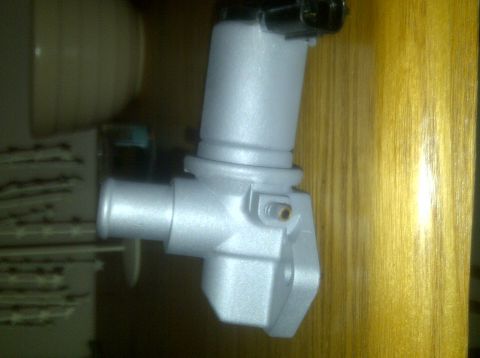2000 Ford Crown Victoria - This is a close-up view of an EGR valve, a component of a vehicle's exhaust system.