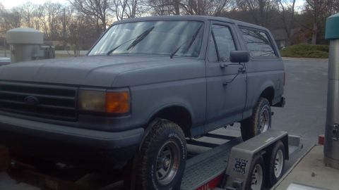 1987 Ford Bronco - This 1987 Ford Bronco is shown on a trailer, ready for transport.