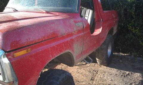 1978 Ford Bronco - This 1978 Ford Bronco is shown from the front three-quarter view, with its driver's door ajar.