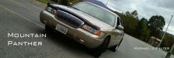 2000 Mercury Grand Marquis - This 2000 Mercury Grand Marquis is seen from a 3q-front angle, displaying its gold paint and license plate L2666.