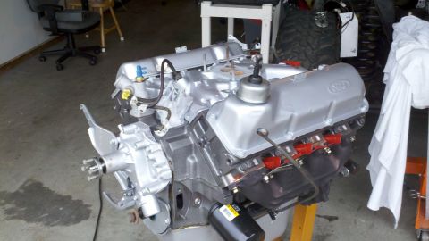 1978 Ford Bronco - A Ford V8 engine, likely undergoing a rebuild, is shown on an engine stand.