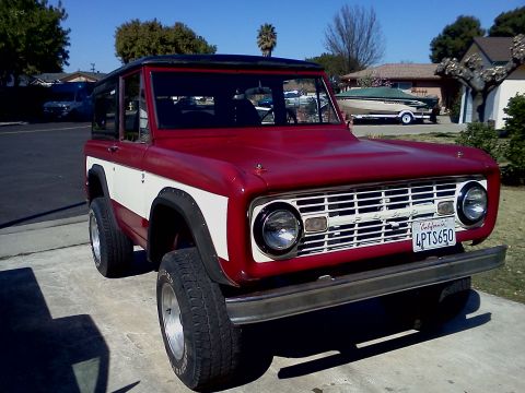 1968 Ford Bronco - This 1968 Ford Bronco is parked in a suburban driveway on a sunny day.