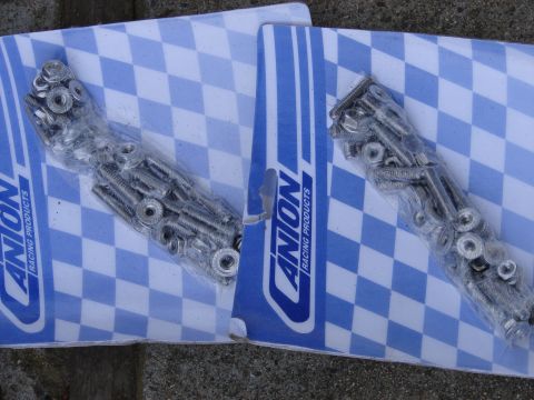 1973 Ford Ranchero - Hardware kits from ANION Racing Products are shown laid out on a blue and white checkered surface.