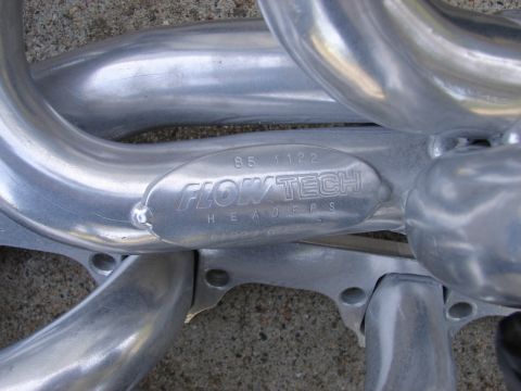 1973 Ford Ranchero - Close-up of Flowtech headers, showing the brand name and part number.
