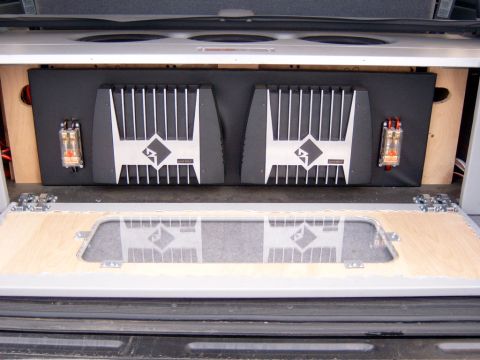 1995 Ford Bronco - Access panel is on 4 cabinet hinges that are spring loaded, they keep the panel from moving and vibrating. the Punch 500II runs the subs, a…