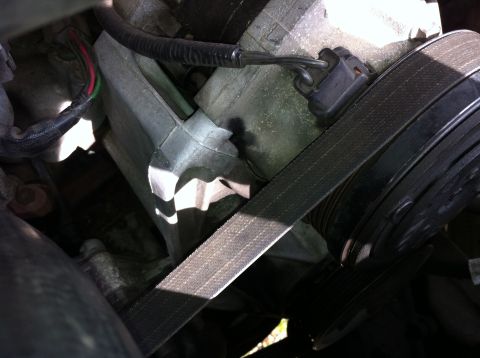 1992 Ford F-150 - This image shows an alternator and serpentine belt, not a 1992 Ford F-150.