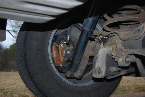 1975 Ford Ranchero - Rear drum brake assembly detail, showing suspension components and brake hardware.