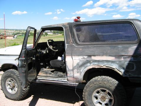 1978 Ford Bronco - This 1978 Ford Bronco is undergoing bodywork, with the driver's door open to reveal the interior.