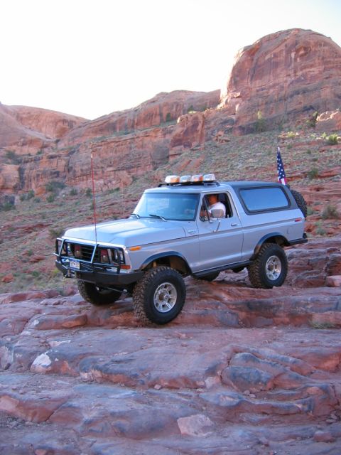1978 Ford Bronco - This 1978 Ford Bronco is equipped for off-road adventures in a rocky desert landscape.