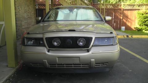 2000 Mercury Grand Marquis - Front view of a 2000 Mercury Grand Marquis parked outside.