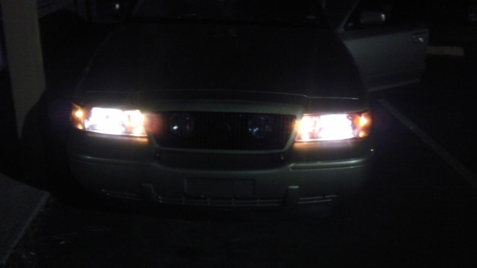 2000 Mercury Grand Marquis front view with headlights on