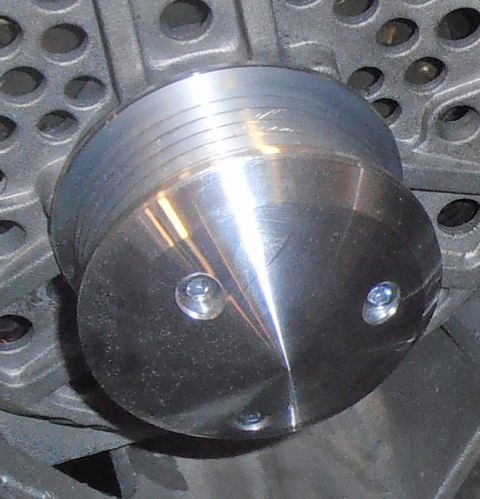 1990 Ford Bronco - Close-up view of a metal pulley, likely from an engine component.