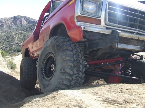 1978 Ford Bronco - This modified 1978 Ford Bronco navigates challenging off-road conditions with its substantial tires and lifted suspension.