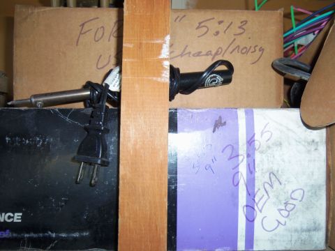 1968 Ford Bronco - Boxes with handwritten labels, including one that says "FOR 5:13 cheap/noisy" and another with "OEM Good" and numbers.