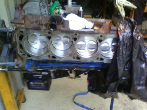 1989 Ford Bronco - Engine block with pistons visible, undergoing rebuild or maintenance.