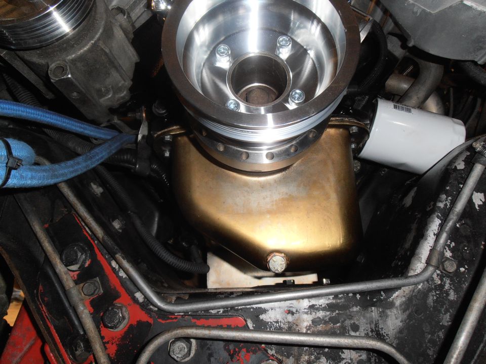 Engine oil pan and pulley system