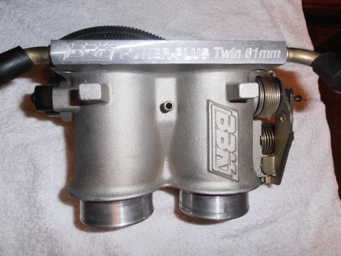 1990 Ford Bronco - Close-up of a BBK Power-Plus Twin 61mm throttle body part.