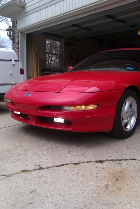1996 Ford Probe - Front view of a red 1996 Ford Probe.