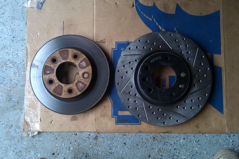 1996 Ford Probe - Comparison: stock rotor next to R1 Concept Mazda6 rotor.