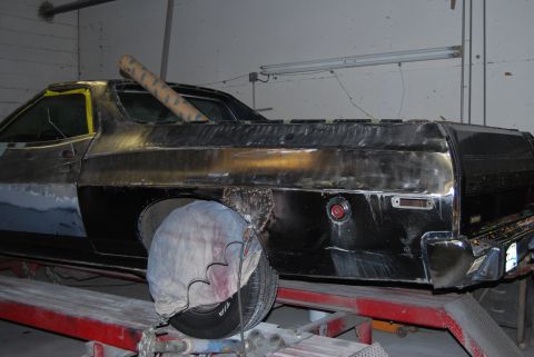 1975 Ford Ranchero - This 1975 Ford Ranchero is in the process of body repair, with primer visible on the front fender and bare metal on the rear.
